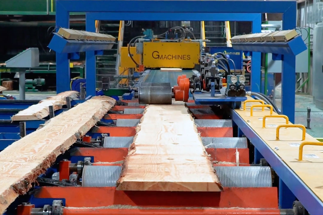 G Machine Company high speed linear edger system featuring Nelson Bros Engineering optimization and Joe Scan heads at Trinity River Lumber sawmill.